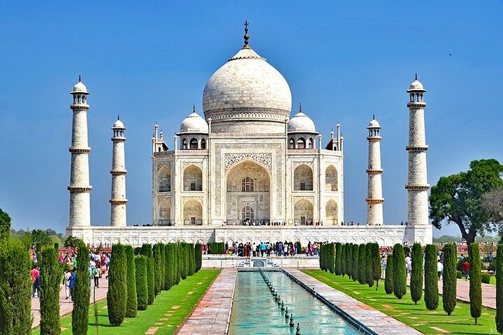 Witness the stunning Taj Mahal a symbol of love framed by lush gardens and reflecting pools. Explore Agra's rich history and architectural beauty on this unforgettable journey.